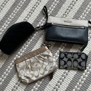 Lot of 4 designer brand wallets/clutches, used condition.